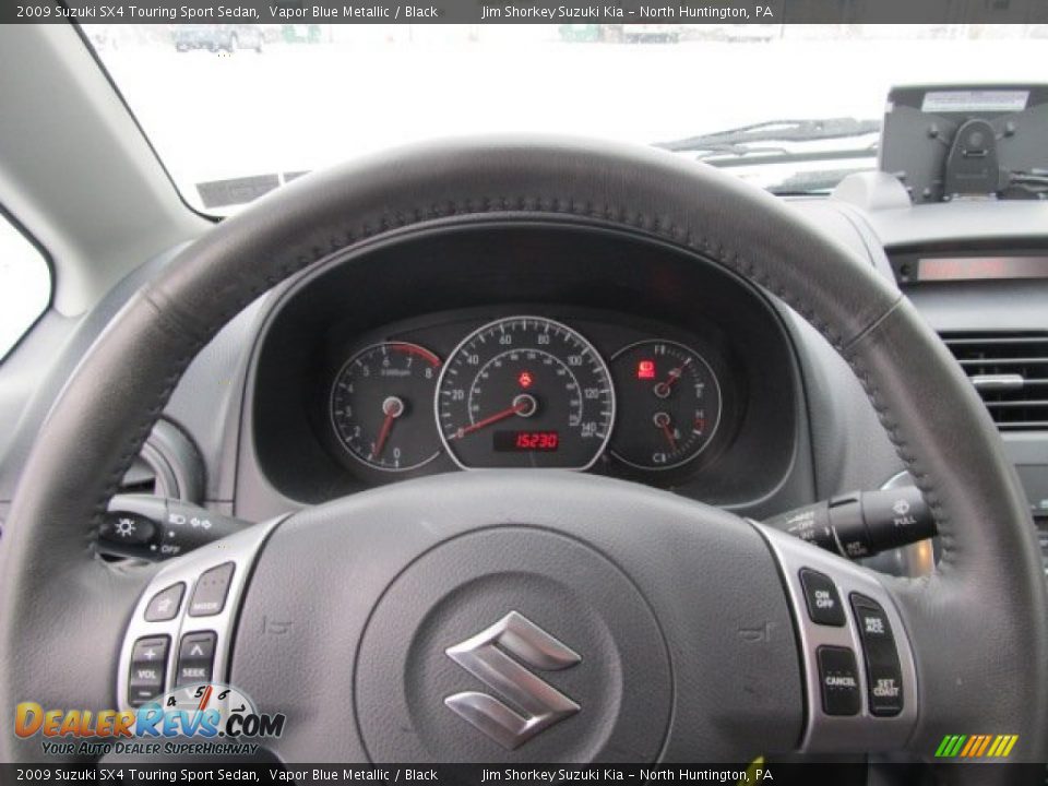 2009 Suzuki SX4 Touring Sport Sedan Vapor Blue Metallic / Black Photo #12