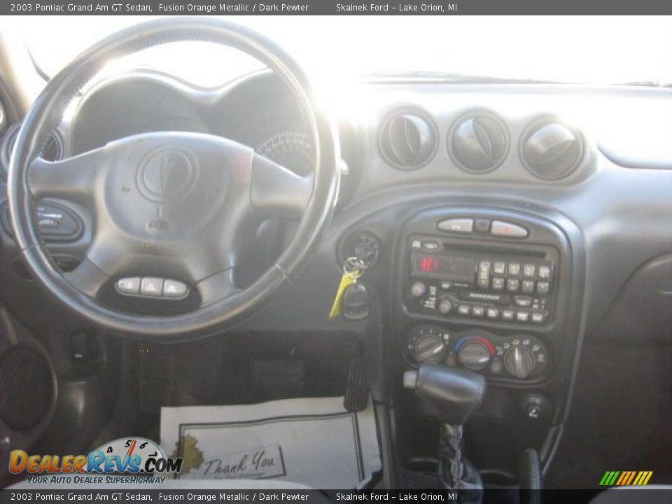 2003 Pontiac Grand Am GT Sedan Fusion Orange Metallic / Dark Pewter Photo #4