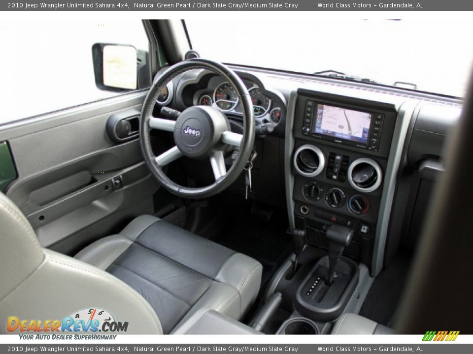 Dashboard of 2010 Jeep Wrangler Unlimited Sahara 4x4 Photo #28