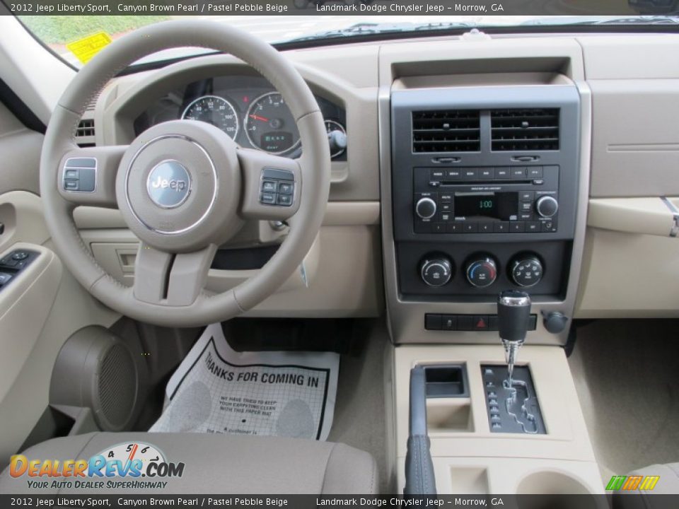 Dashboard of 2012 Jeep Liberty Sport Photo #11