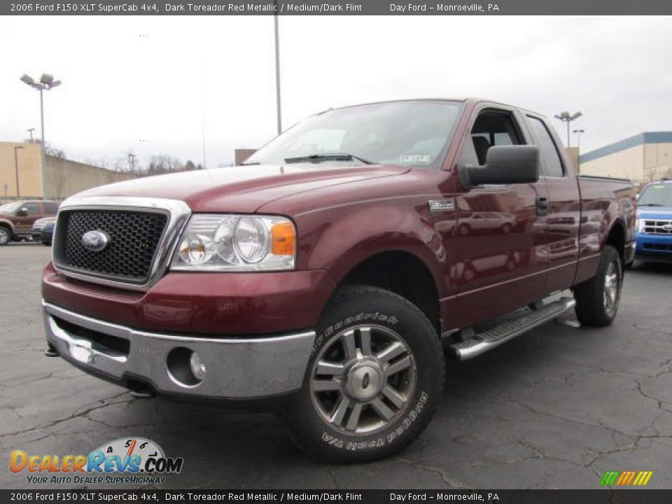 Front 3/4 View of 2006 Ford F150 XLT SuperCab 4x4 Photo #1