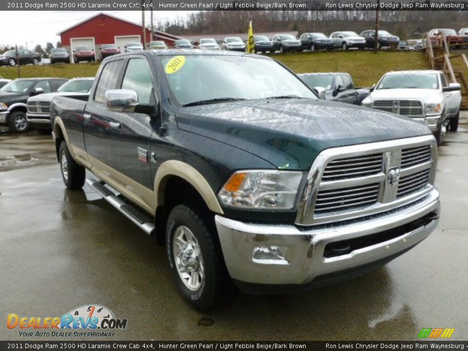 Front 3/4 View of 2011 Dodge Ram 2500 HD Laramie Crew Cab 4x4 Photo #7