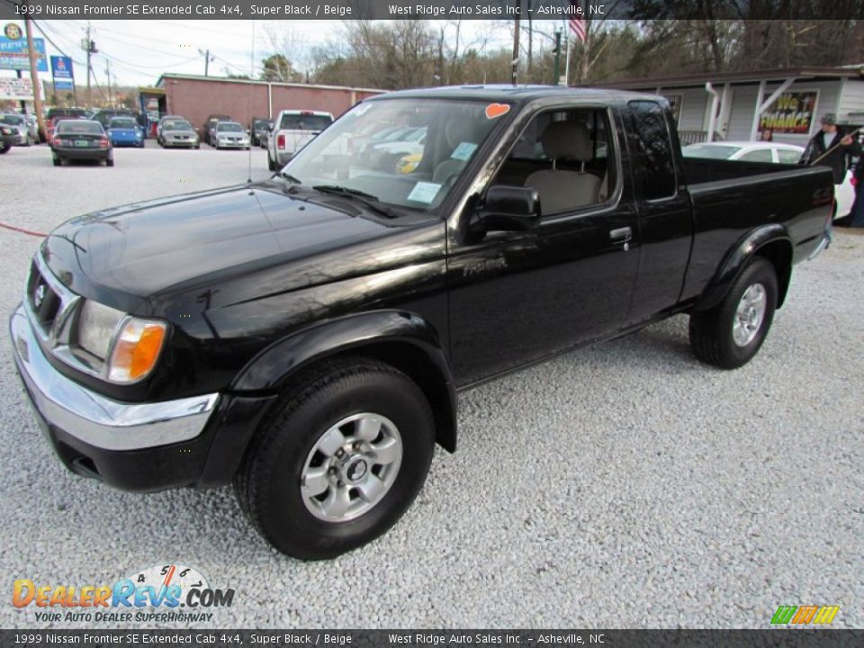 Front 3/4 View of 1999 Nissan Frontier SE Extended Cab 4x4 Photo #11
