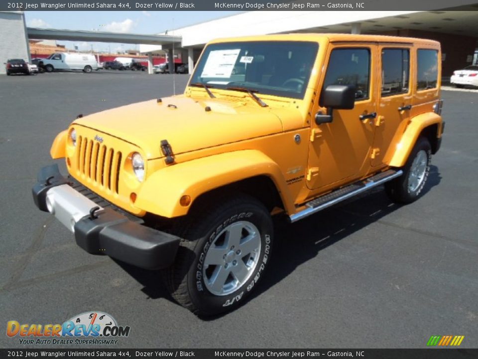 2012 Jeep Wrangler Unlimited Sahara 4x4 Dozer Yellow / Black Photo #1