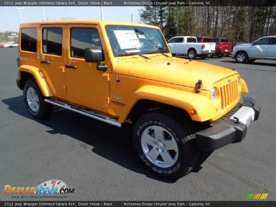 2012 Jeep Wrangler Unlimited Sahara 4x4 Dozer Yellow / Black Photo #2