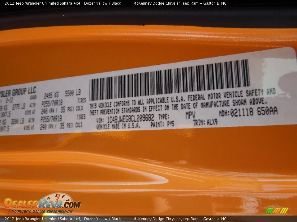 2012 Jeep Wrangler Unlimited Sahara 4x4 Dozer Yellow / Black Photo #5