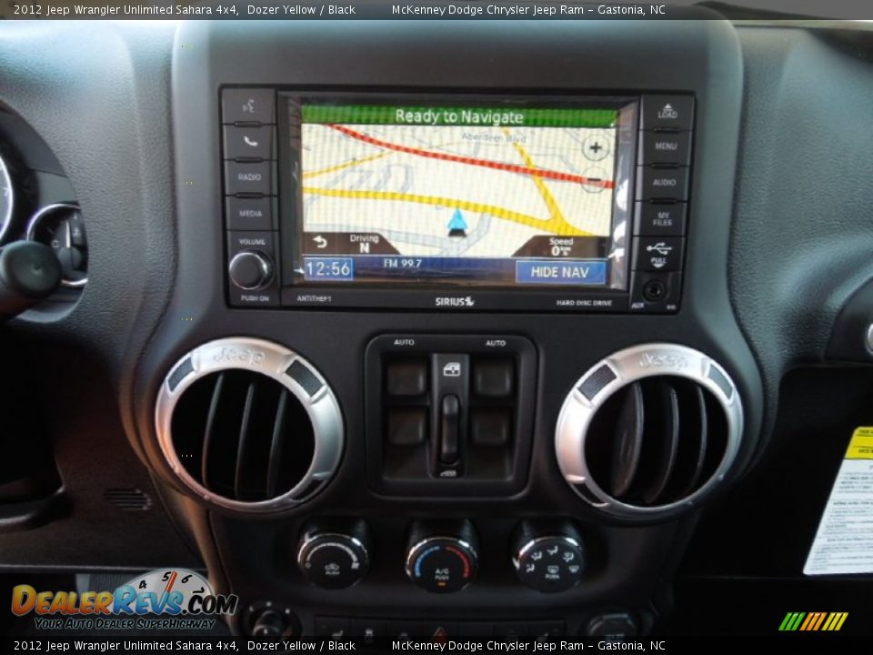 2012 Jeep Wrangler Unlimited Sahara 4x4 Dozer Yellow / Black Photo #12