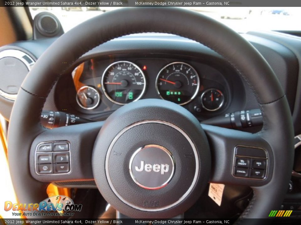 2012 Jeep Wrangler Unlimited Sahara 4x4 Dozer Yellow / Black Photo #13