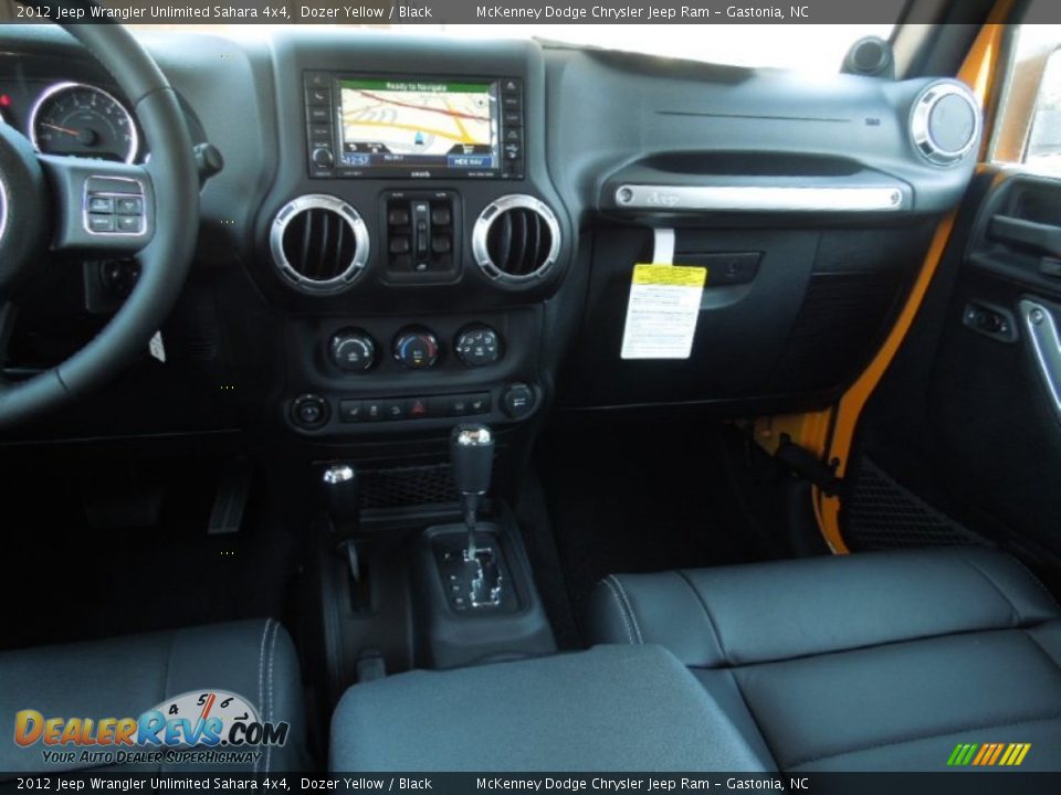 2012 Jeep Wrangler Unlimited Sahara 4x4 Dozer Yellow / Black Photo #17