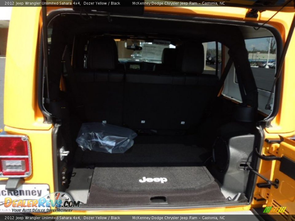 2012 Jeep Wrangler Unlimited Sahara 4x4 Dozer Yellow / Black Photo #18