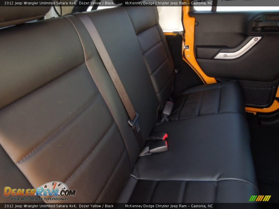 2012 Jeep Wrangler Unlimited Sahara 4x4 Dozer Yellow / Black Photo #19
