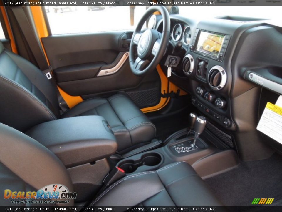 2012 Jeep Wrangler Unlimited Sahara 4x4 Dozer Yellow / Black Photo #21