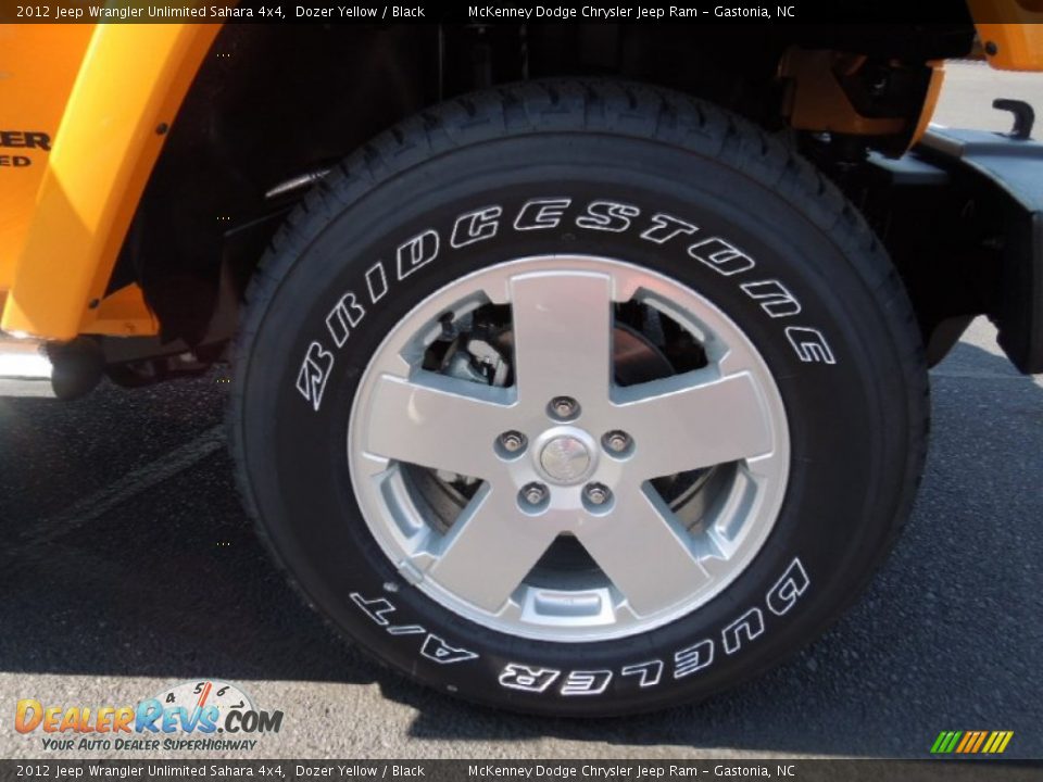 2012 Jeep Wrangler Unlimited Sahara 4x4 Dozer Yellow / Black Photo #23