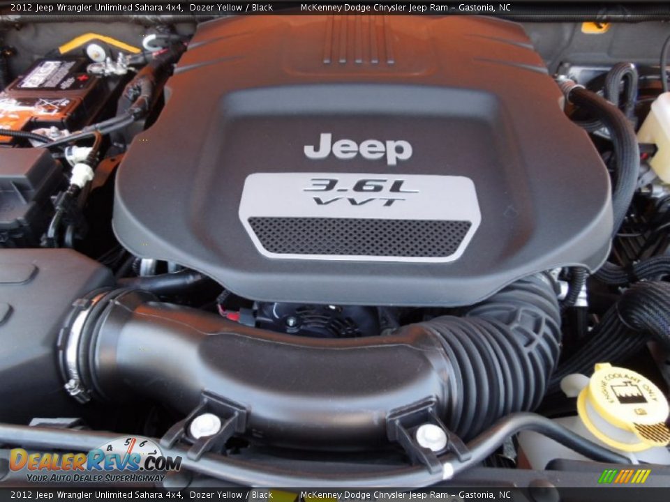 2012 Jeep Wrangler Unlimited Sahara 4x4 Dozer Yellow / Black Photo #24