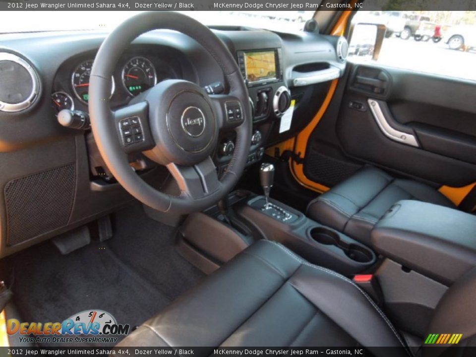 2012 Jeep Wrangler Unlimited Sahara 4x4 Dozer Yellow / Black Photo #25