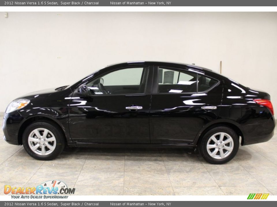 2012 Nissan versa sedan black #8