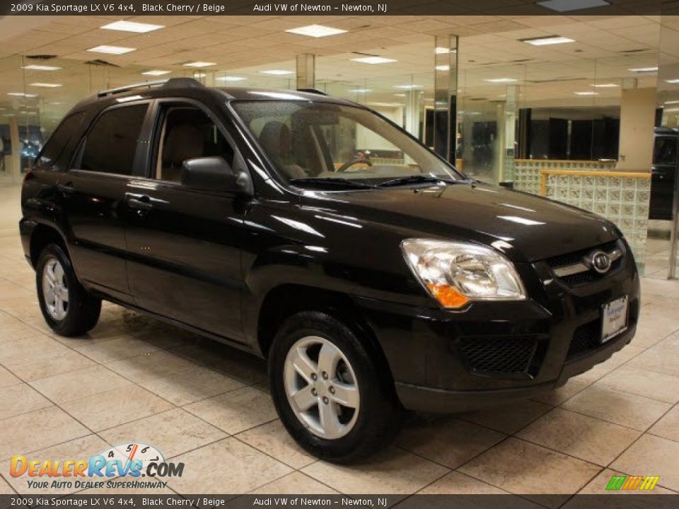2009 Kia Sportage LX V6 4x4 Black Cherry / Beige Photo #1