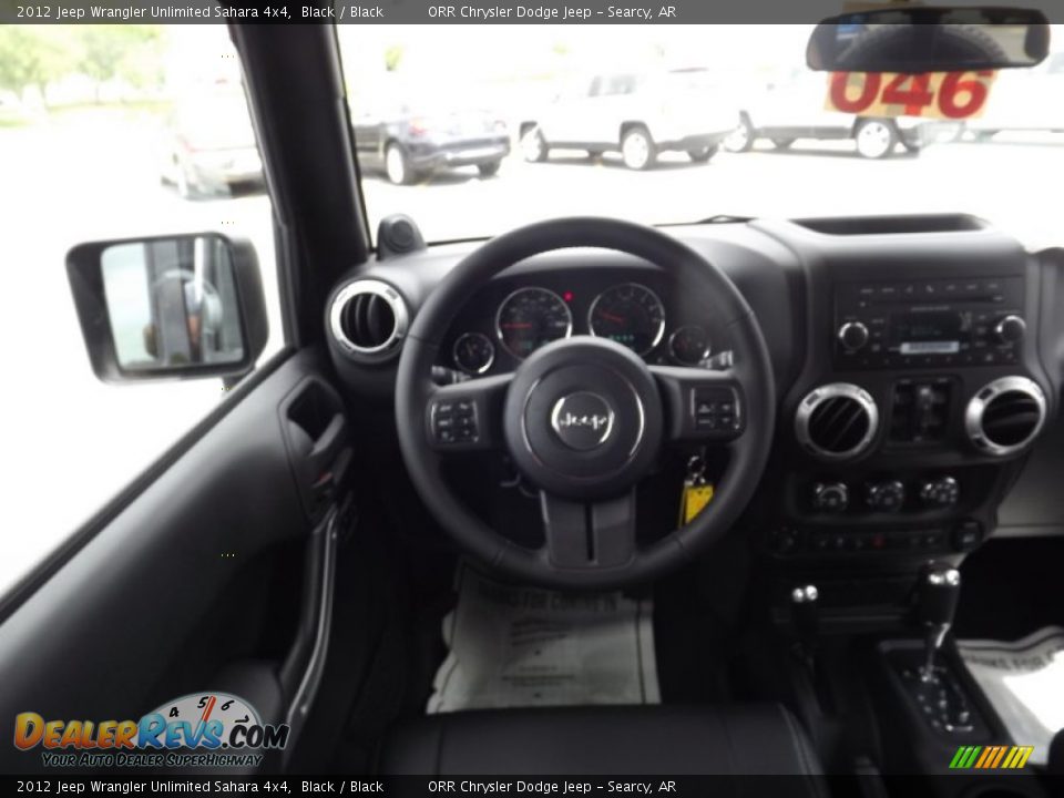 2012 Jeep Wrangler Unlimited Sahara 4x4 Black / Black Photo #9