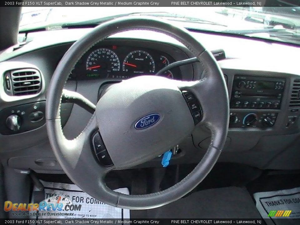 2003 Ford F150 XLT SuperCab Steering Wheel Photo #13