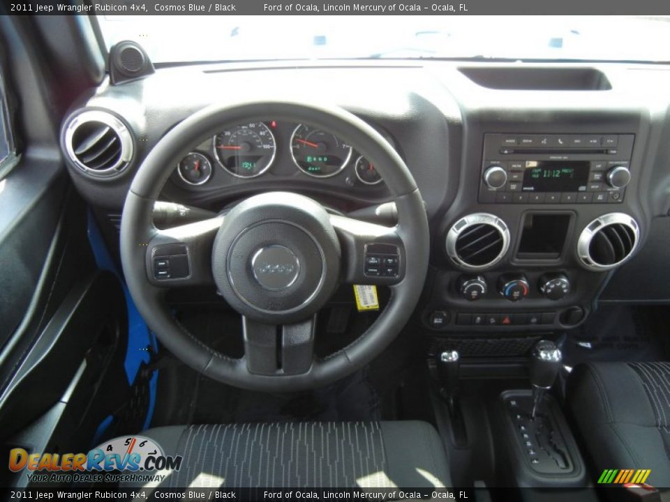 Dashboard of 2011 Jeep Wrangler Rubicon 4x4 Photo #21