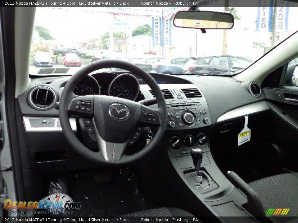 2012 Mazda MAZDA3 i Touring 4 Door Liquid Silver Metallic / Black Photo #12