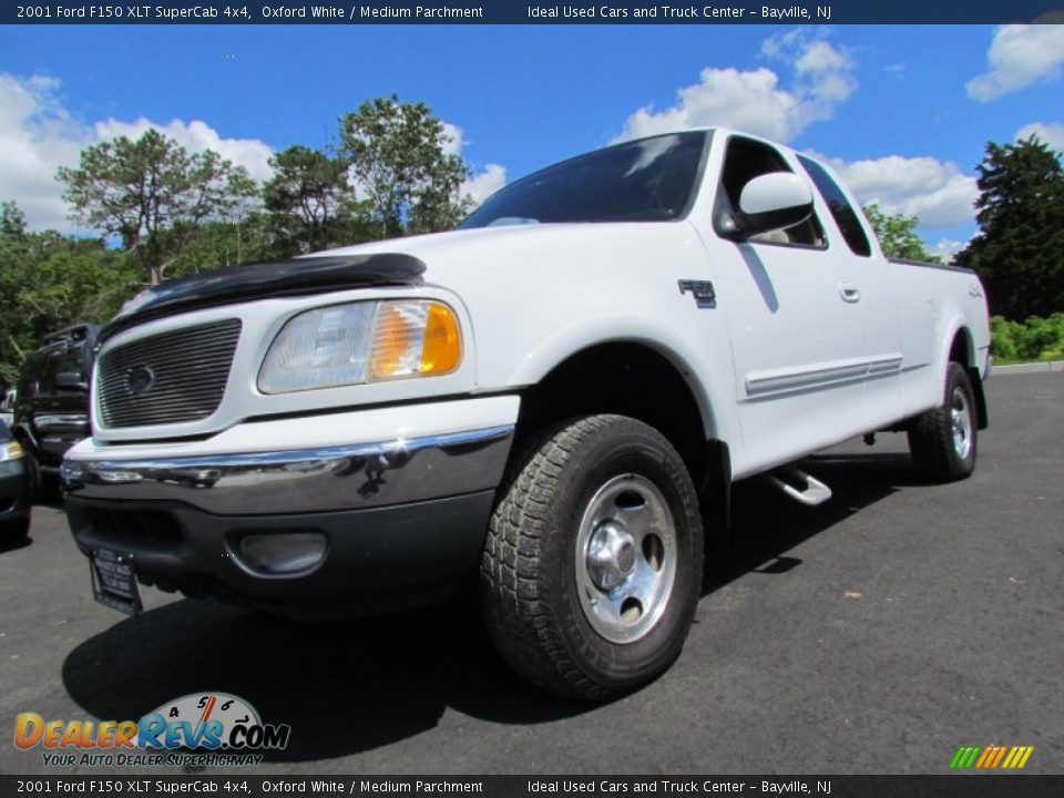 Front 3/4 View of 2001 Ford F150 XLT SuperCab 4x4 Photo #1