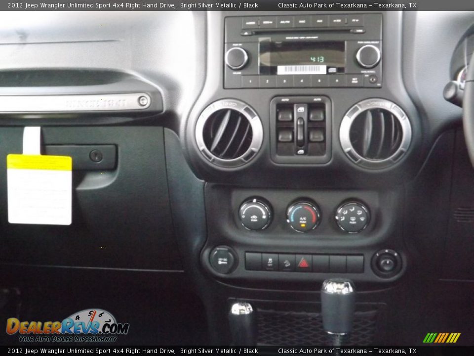 Controls of 2012 Jeep Wrangler Unlimited Sport 4x4 Right Hand Drive Photo #10