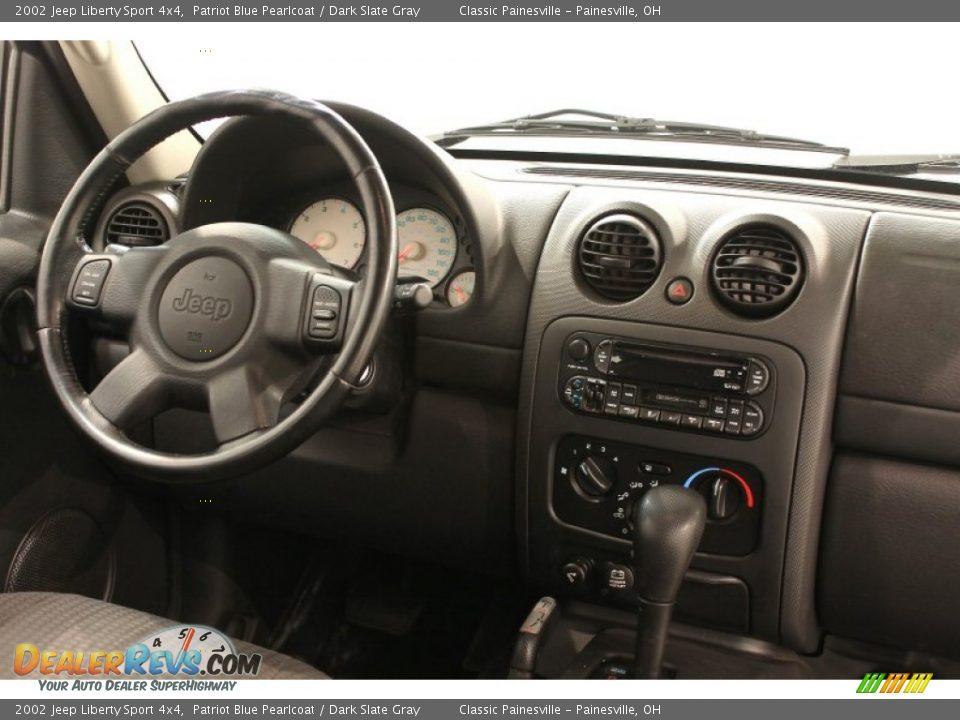 Dashboard of 2002 Jeep Liberty Sport 4x4 Photo #15