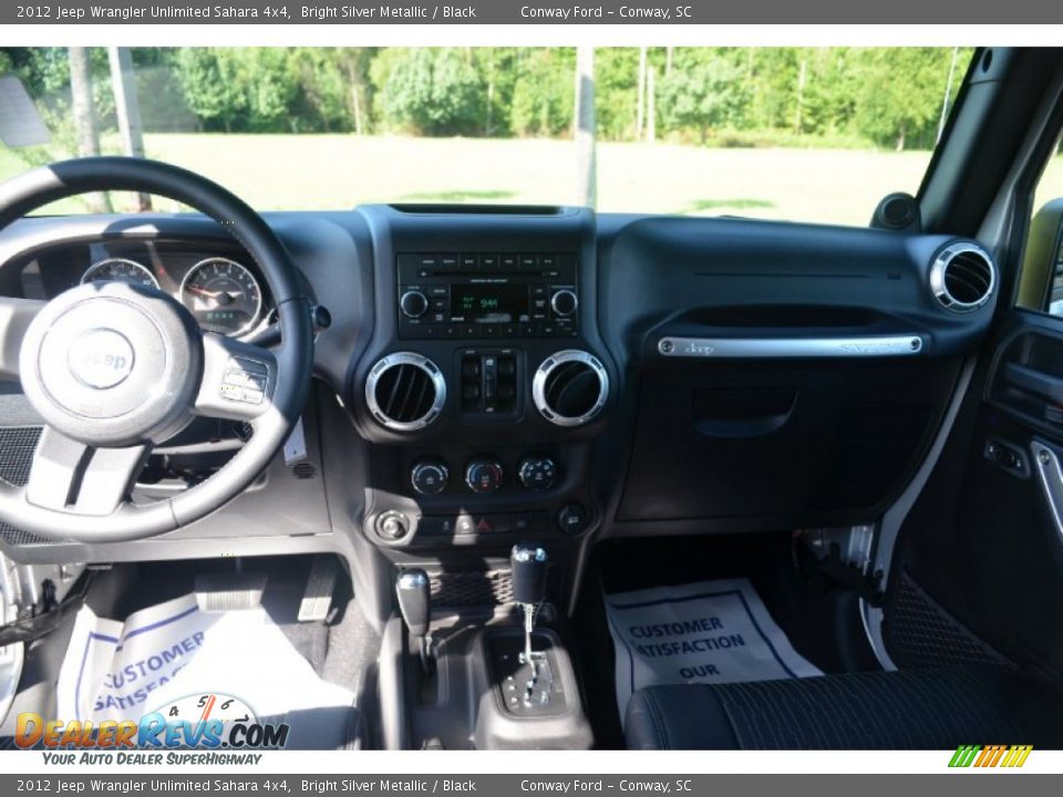 2012 Jeep Wrangler Unlimited Sahara 4x4 Bright Silver Metallic / Black Photo #15