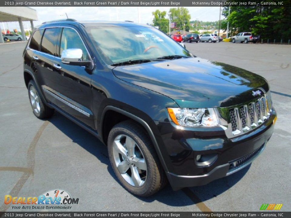 Front 3/4 View of 2013 Jeep Grand Cherokee Overland Photo #1