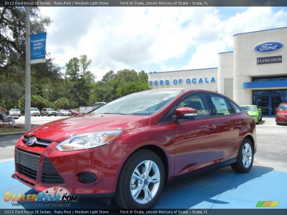 2013 Ford Focus SE Sedan Ruby Red / Medium Light Stone Photo #1