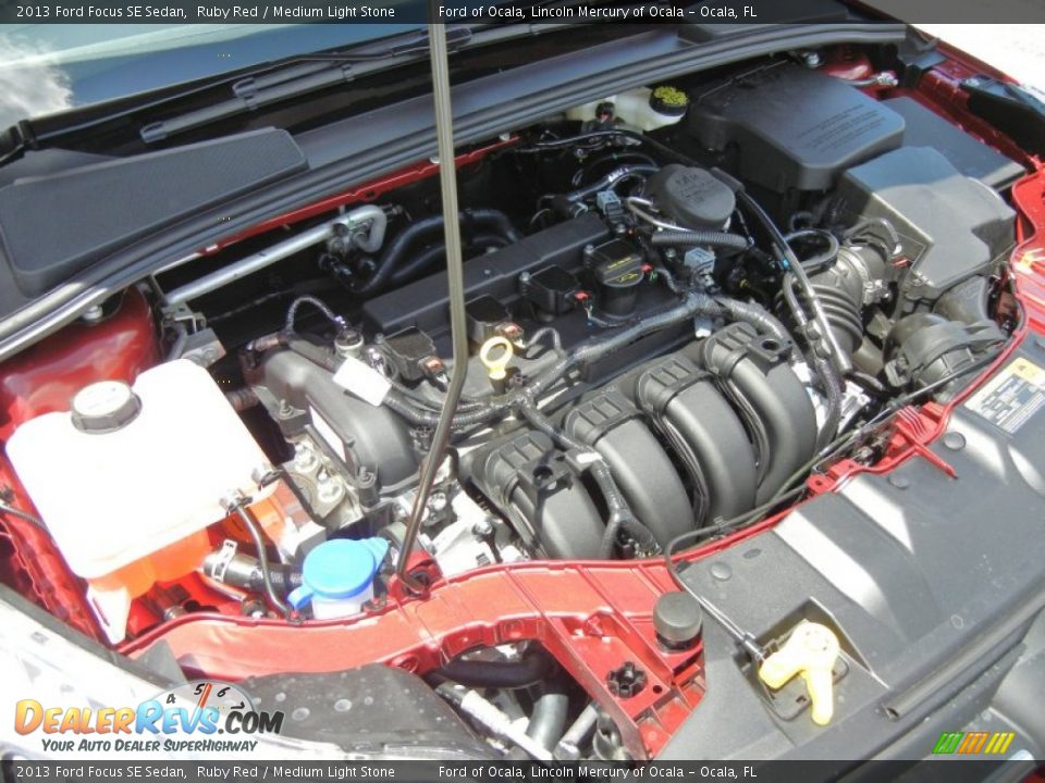 2013 Ford Focus SE Sedan Ruby Red / Medium Light Stone Photo #11