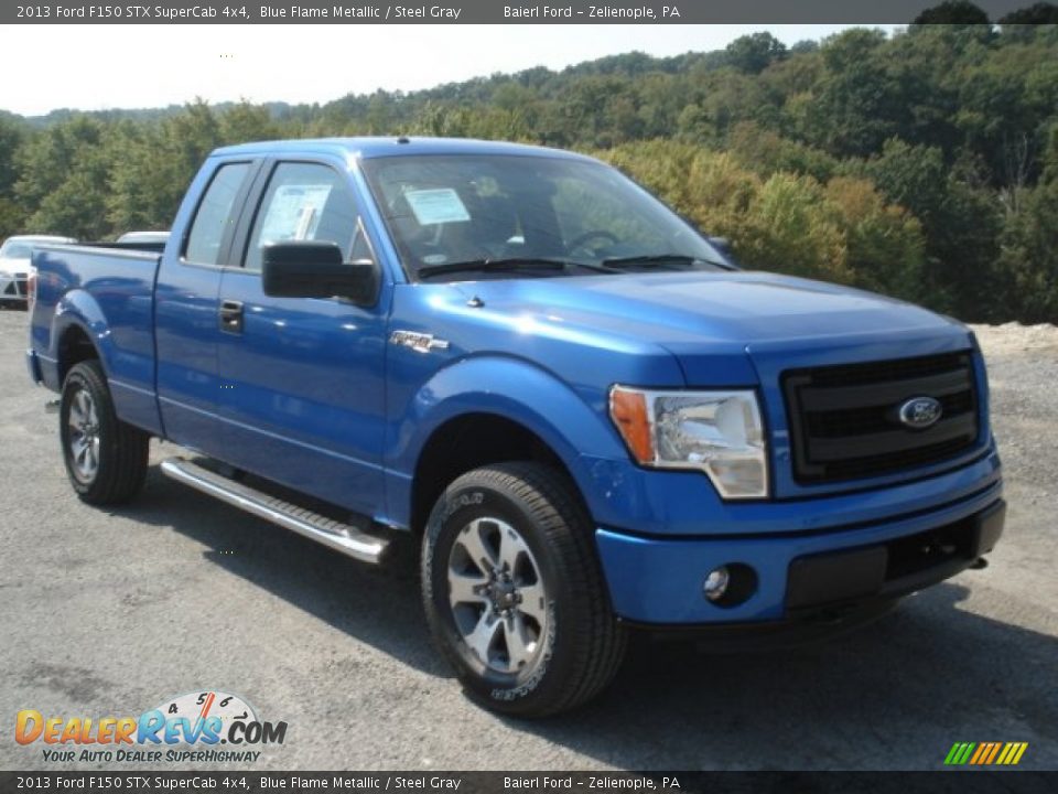 Front 3/4 View of 2013 Ford F150 STX SuperCab 4x4 Photo #2