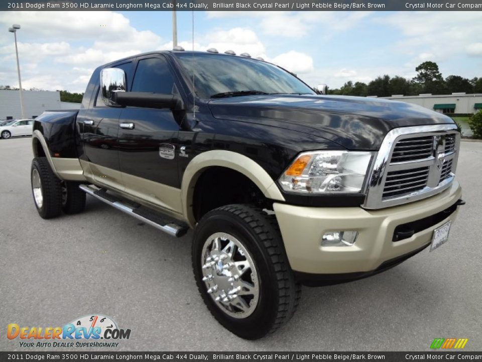 Front 3/4 View of 2011 Dodge Ram 3500 HD Laramie Longhorn Mega Cab 4x4 Dually Photo #10