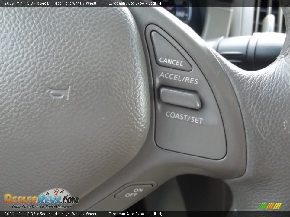 2009 Infiniti G 37 x Sedan Moonlight White / Wheat Photo #23