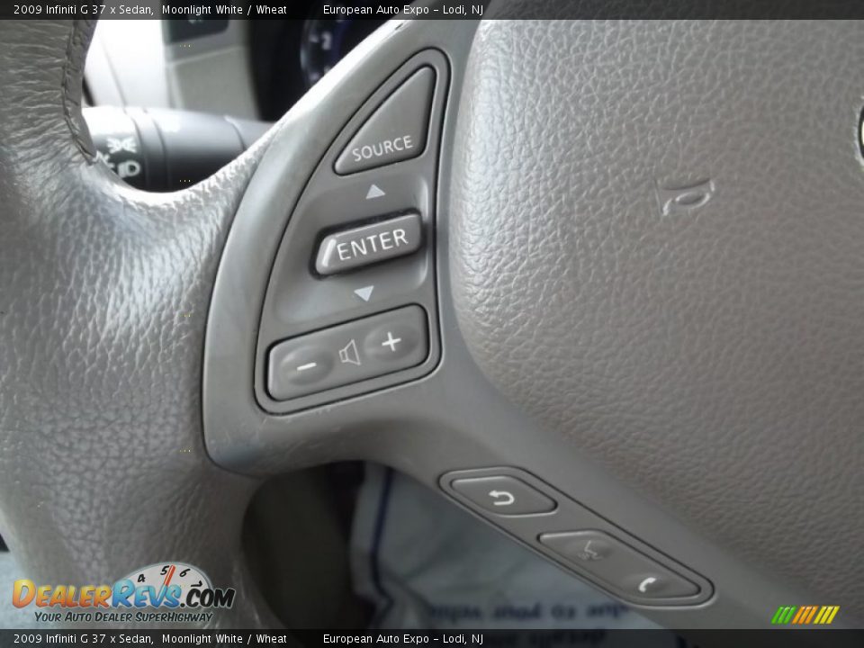 2009 Infiniti G 37 x Sedan Moonlight White / Wheat Photo #24