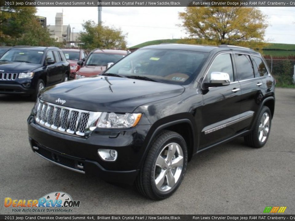 Front 3/4 View of 2013 Jeep Grand Cherokee Overland Summit 4x4 Photo #2
