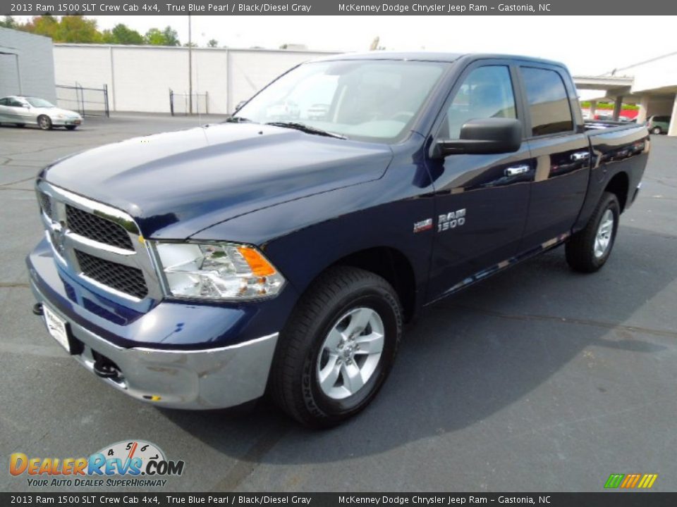 Front 3/4 View of 2013 Ram 1500 SLT Crew Cab 4x4 Photo #2