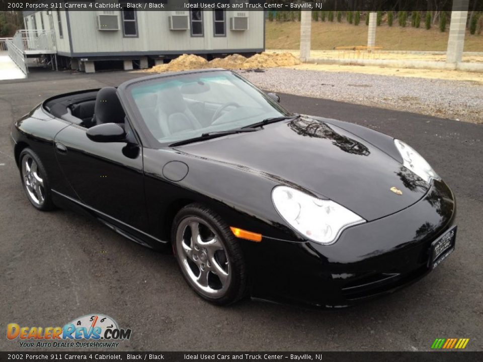 Front 3/4 View of 2002 Porsche 911 Carrera 4 Cabriolet Photo #5