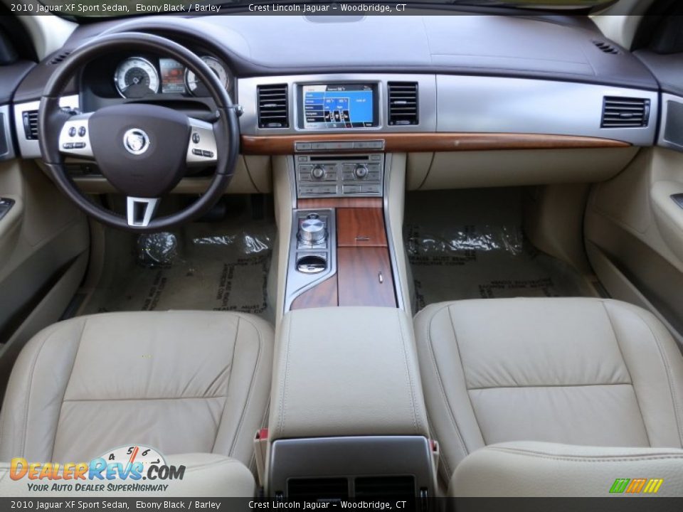 Dashboard of 2010 Jaguar XF Sport Sedan Photo #10