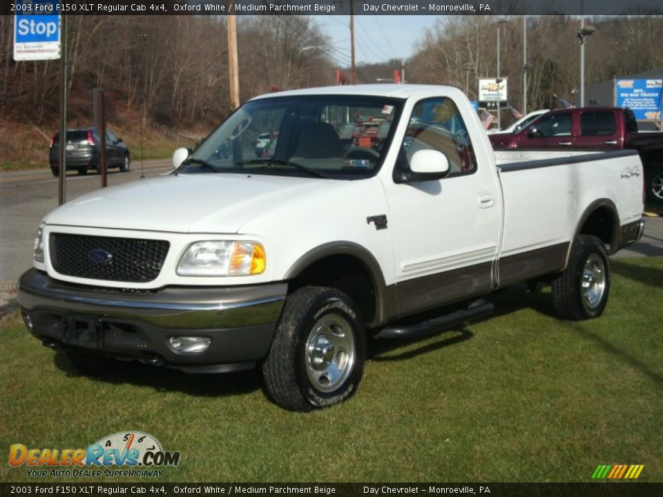 Front 3/4 View of 2003 Ford F150 XLT Regular Cab 4x4 Photo #1