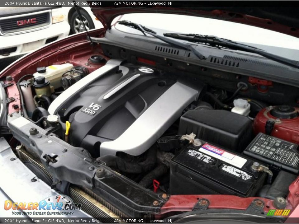 2004 Hyundai Santa Fe GLS 4WD Merlot Red / Beige Photo #11