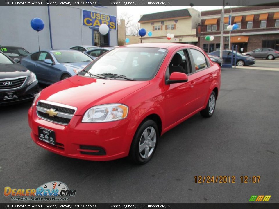 2011 Chevrolet Aveo LT Sedan Victory Red / Charcoal Photo #2