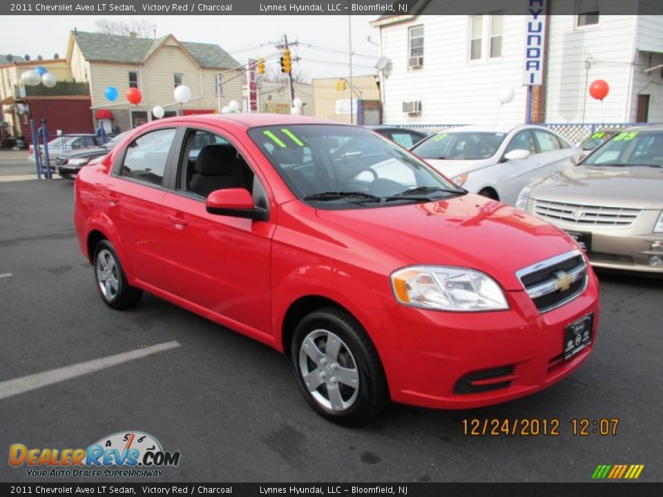 2011 Chevrolet Aveo LT Sedan Victory Red / Charcoal Photo #3
