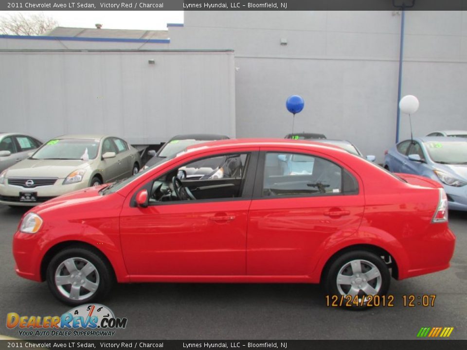 2011 Chevrolet Aveo LT Sedan Victory Red / Charcoal Photo #8