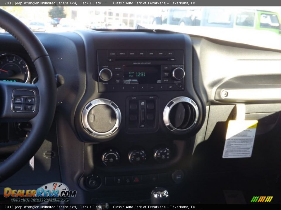 2013 Jeep Wrangler Unlimited Sahara 4x4 Black / Black Photo #9