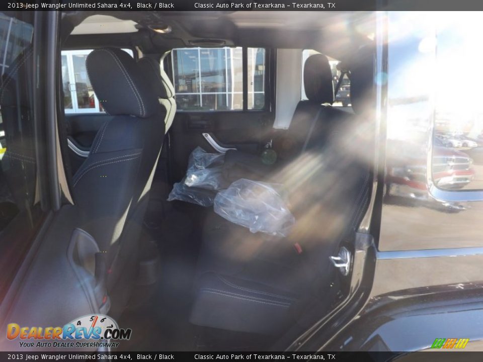 2013 Jeep Wrangler Unlimited Sahara 4x4 Black / Black Photo #12