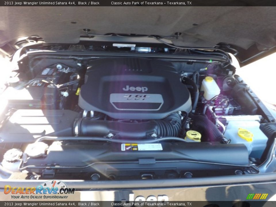2013 Jeep Wrangler Unlimited Sahara 4x4 Black / Black Photo #17