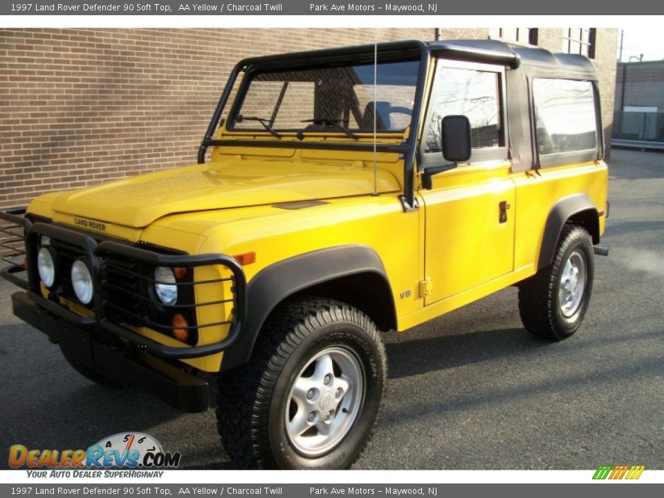 Front 3/4 View of 1997 Land Rover Defender 90 Soft Top Photo #1