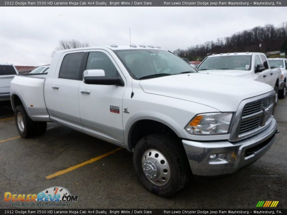 Front 3/4 View of 2012 Dodge Ram 3500 HD Laramie Mega Cab 4x4 Dually Photo #6